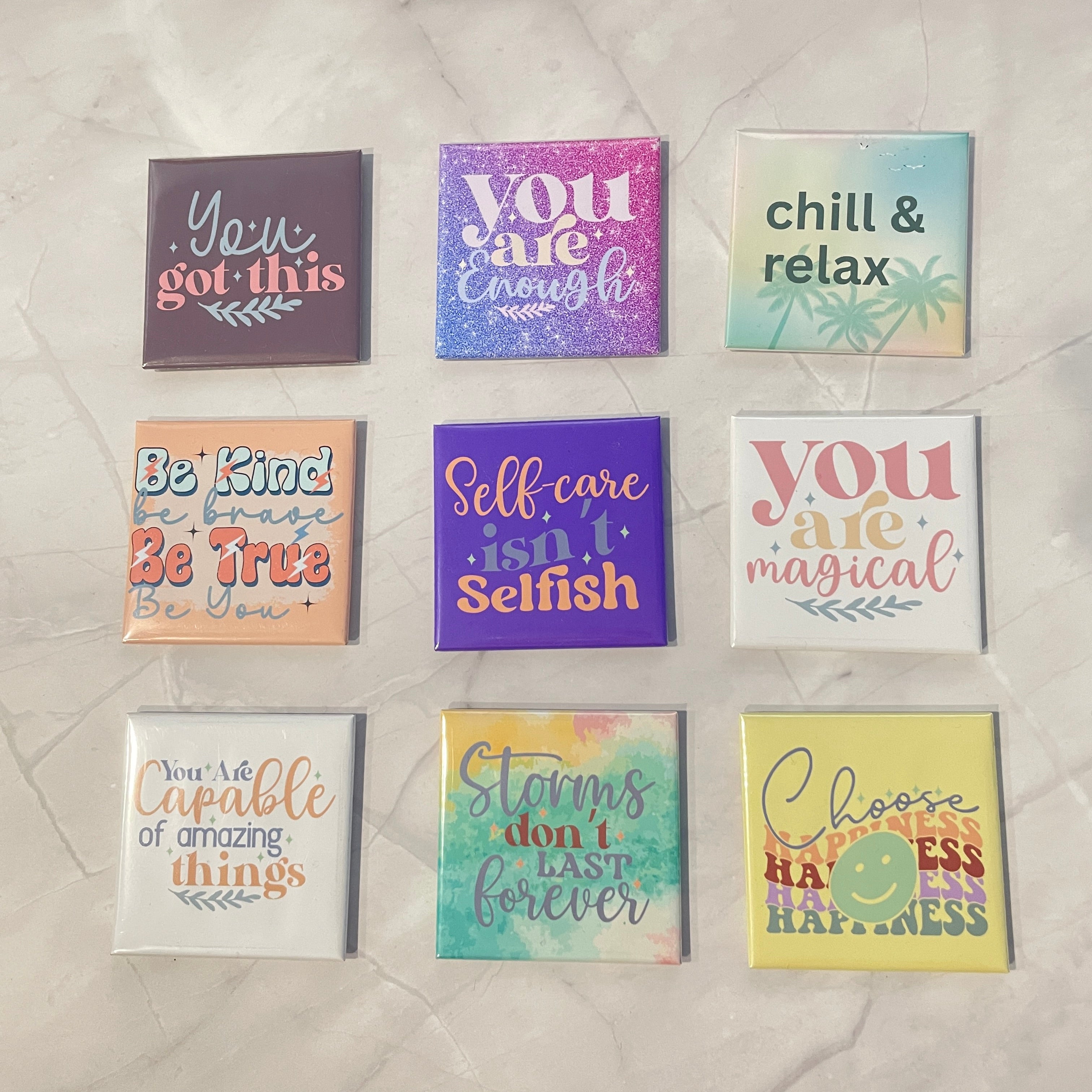 Motivational and affirmation quotes on square photo magnets